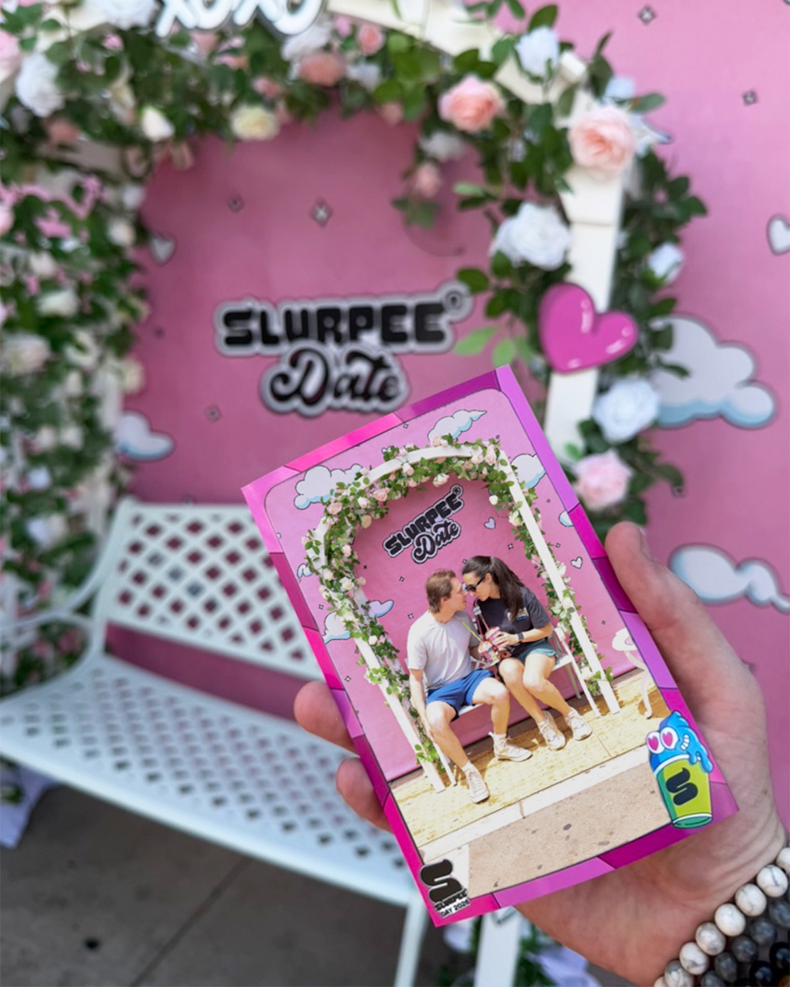 Slurpee Date photo card at the flower-arch backdrop